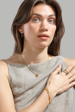 Anillo Vira - Chapado en oro de 18k