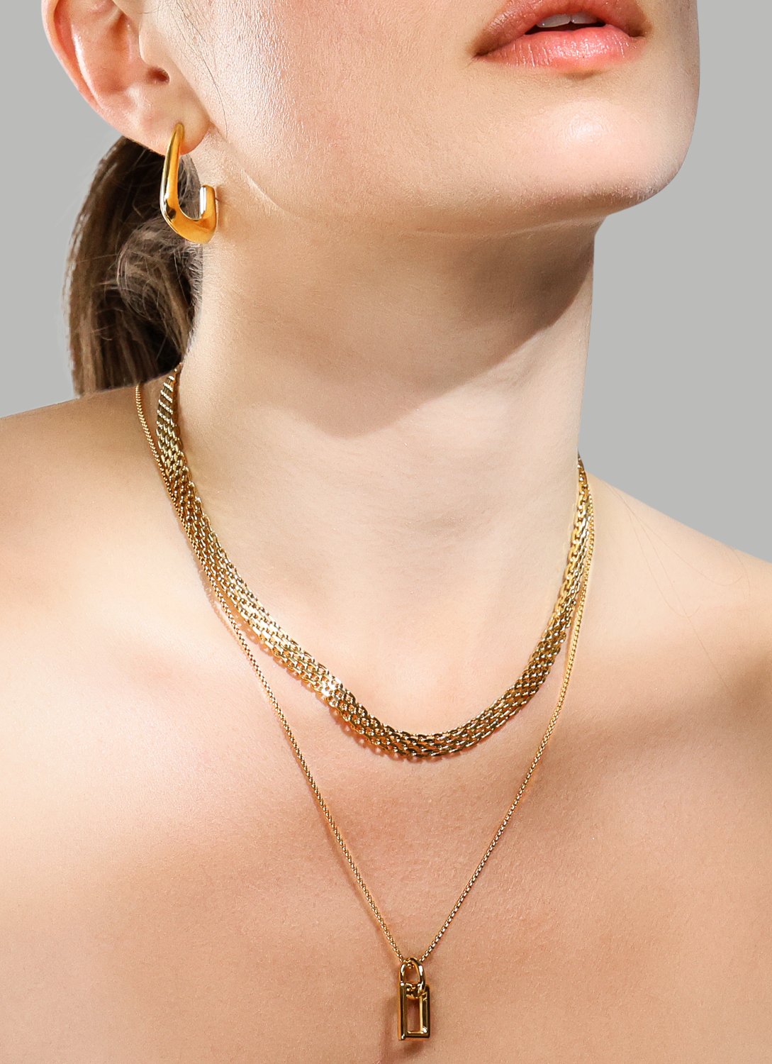 Pendientes Bold Curve – 18k Chapados en oro
