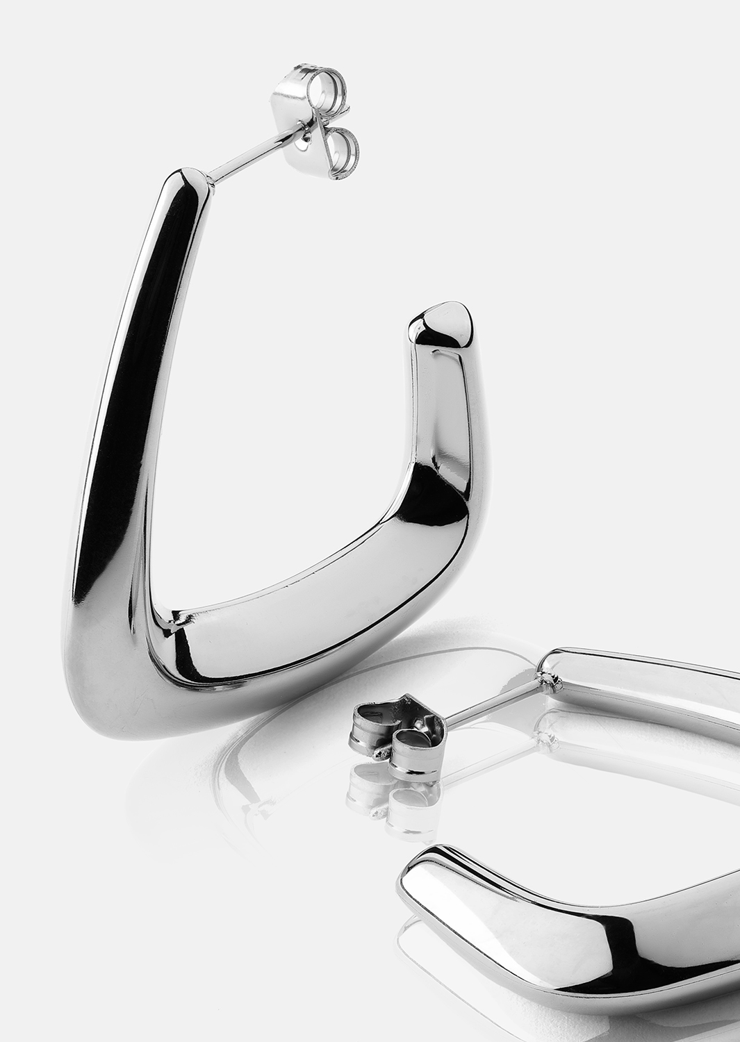 Pendientes Bold Curve – Chapados en plata